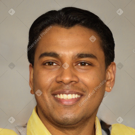 Joyful latino young-adult male with short  black hair and brown eyes