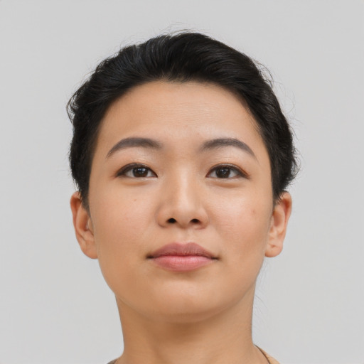 Neutral asian young-adult female with short  brown hair and brown eyes