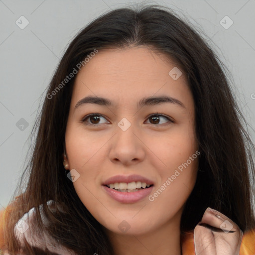 Joyful asian young-adult female with long  brown hair and brown eyes