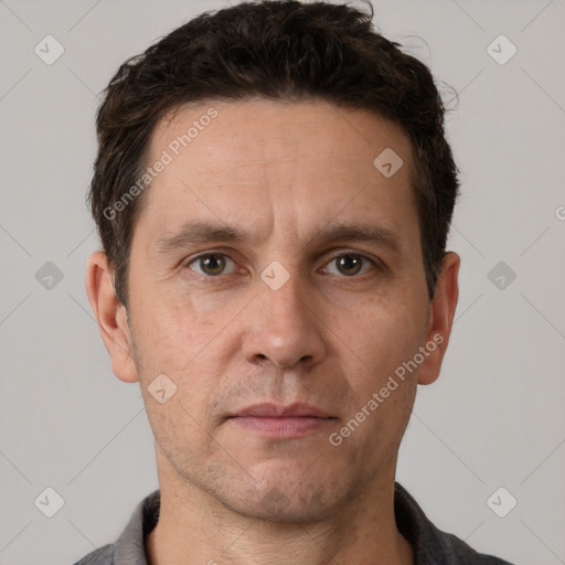 Neutral white adult male with short  brown hair and brown eyes