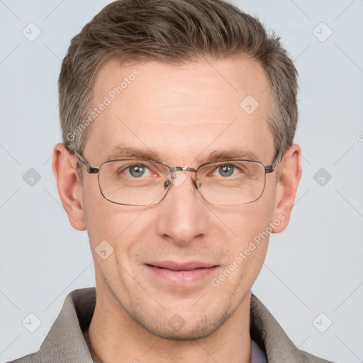 Joyful white adult male with short  brown hair and grey eyes