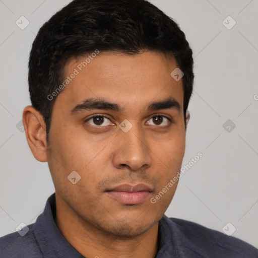 Neutral latino young-adult male with short  black hair and brown eyes