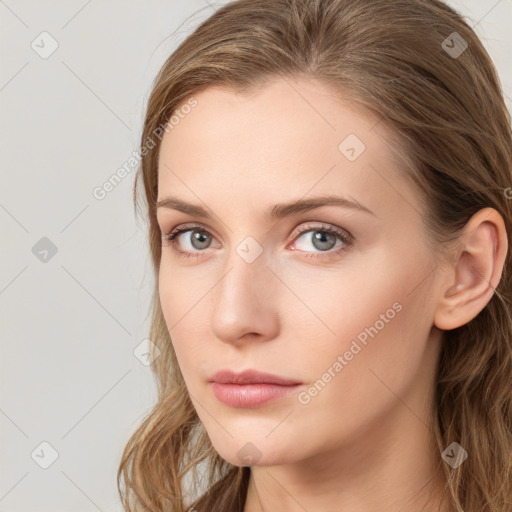 Neutral white young-adult female with long  brown hair and blue eyes