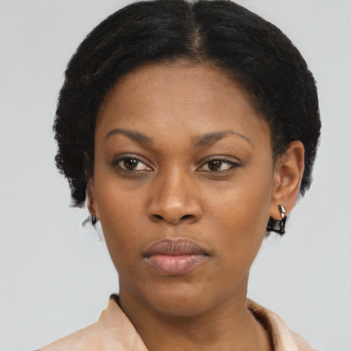 Neutral latino young-adult female with short  brown hair and brown eyes