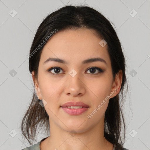 Joyful latino young-adult female with medium  black hair and brown eyes