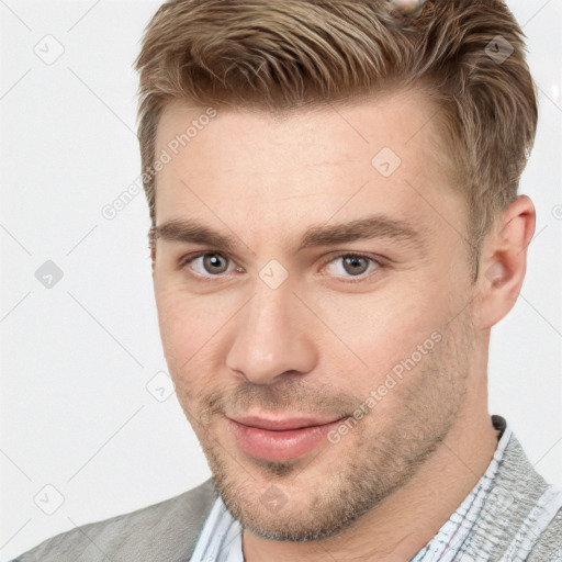 Neutral white young-adult male with short  brown hair and grey eyes