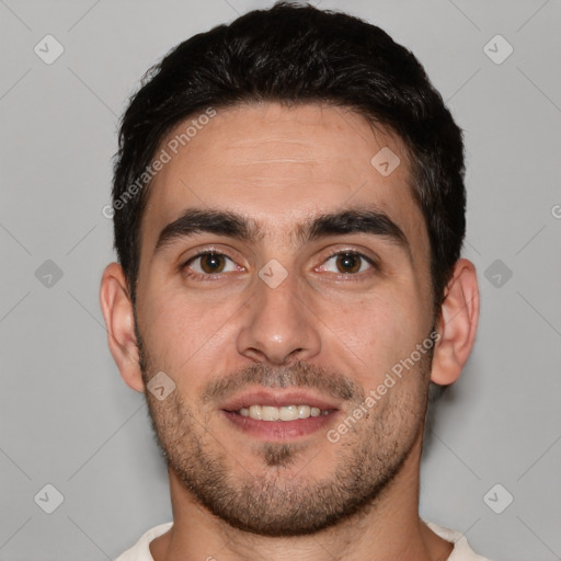 Joyful white young-adult male with short  brown hair and brown eyes