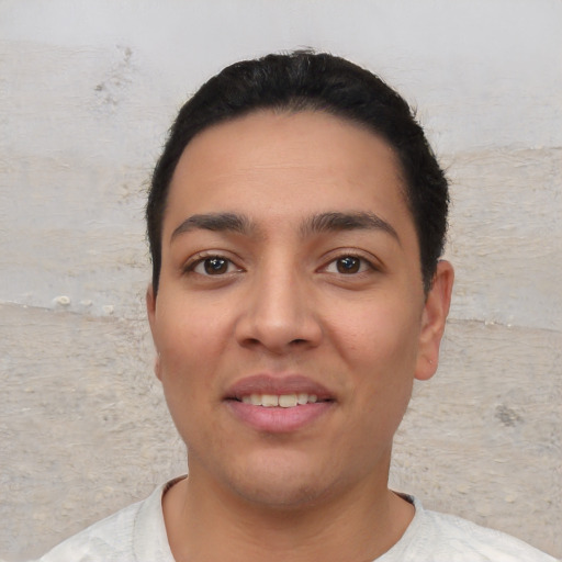 Joyful white young-adult female with short  black hair and brown eyes