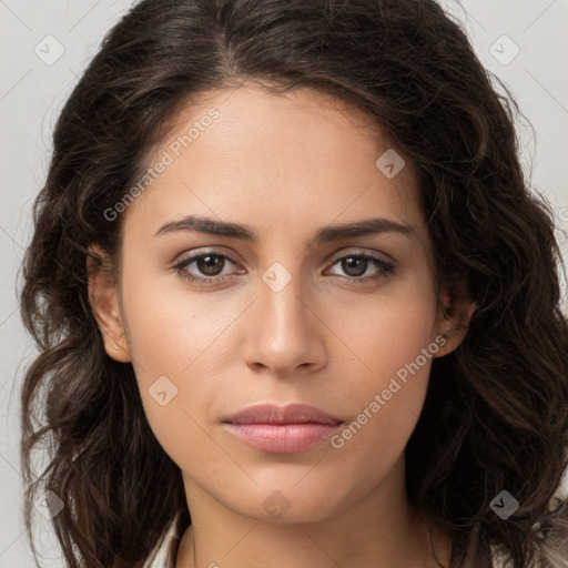 Neutral white young-adult female with long  brown hair and brown eyes