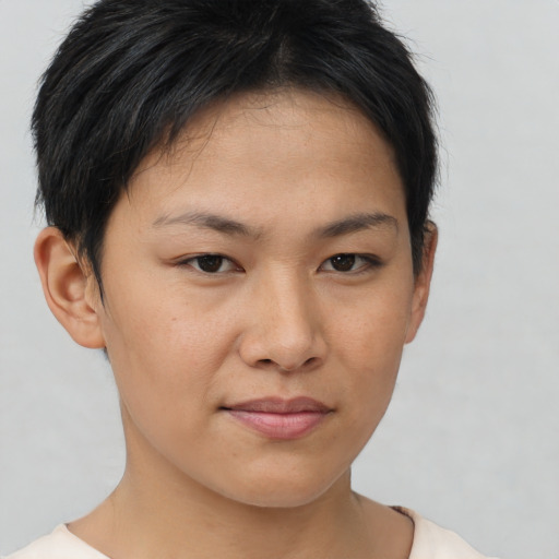 Joyful asian young-adult female with short  brown hair and brown eyes