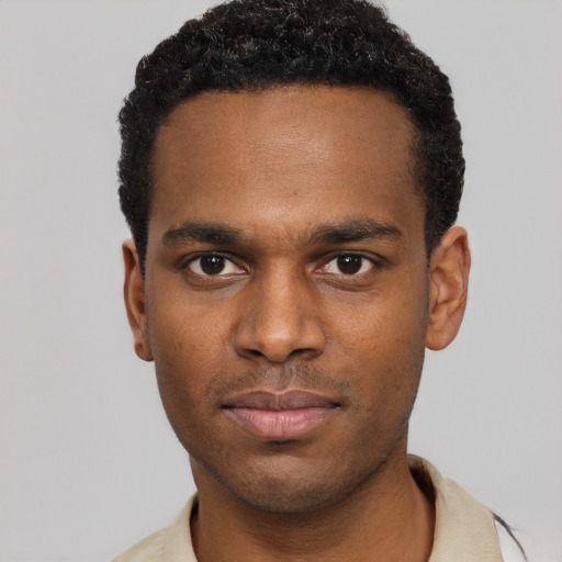 Neutral black young-adult male with short  black hair and brown eyes