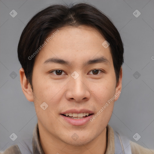 Joyful asian young-adult male with short  brown hair and brown eyes