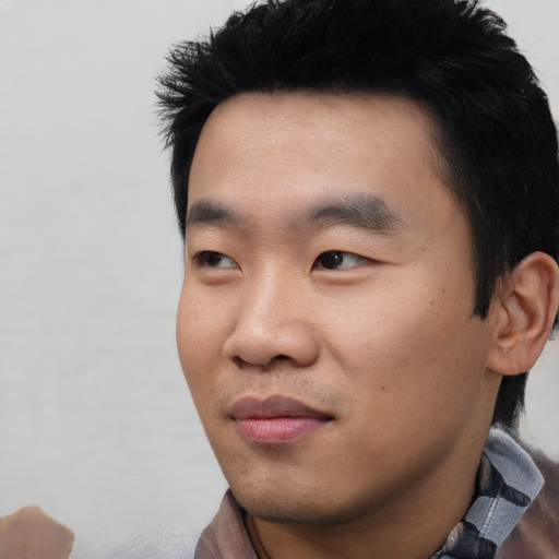 Neutral asian young-adult male with short  black hair and brown eyes