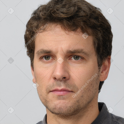 Neutral white adult male with short  brown hair and brown eyes