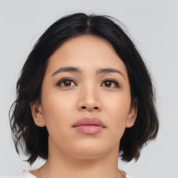 Neutral asian young-adult female with medium  black hair and brown eyes