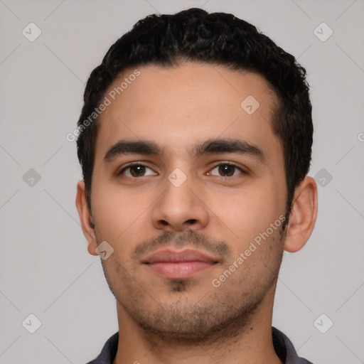 Neutral latino young-adult male with short  black hair and brown eyes