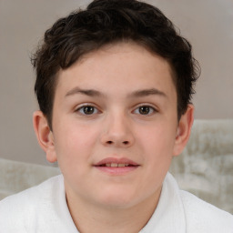 Joyful white child female with short  brown hair and brown eyes