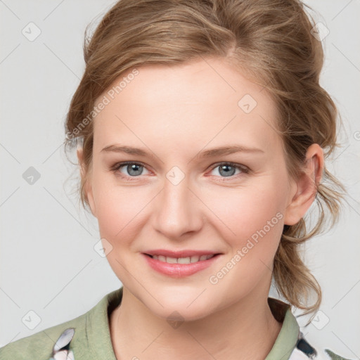 Joyful white young-adult female with medium  brown hair and blue eyes