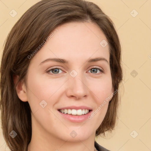 Joyful white young-adult female with medium  brown hair and green eyes