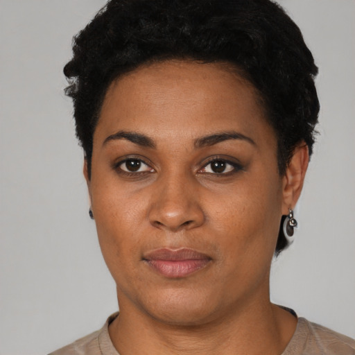 Neutral black young-adult female with short  black hair and brown eyes