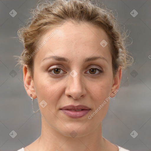 Joyful white adult female with short  brown hair and brown eyes