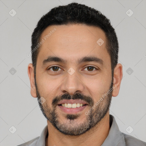 Joyful latino young-adult male with short  black hair and brown eyes