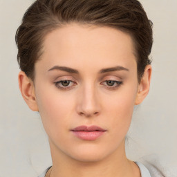 Neutral white young-adult female with short  brown hair and brown eyes