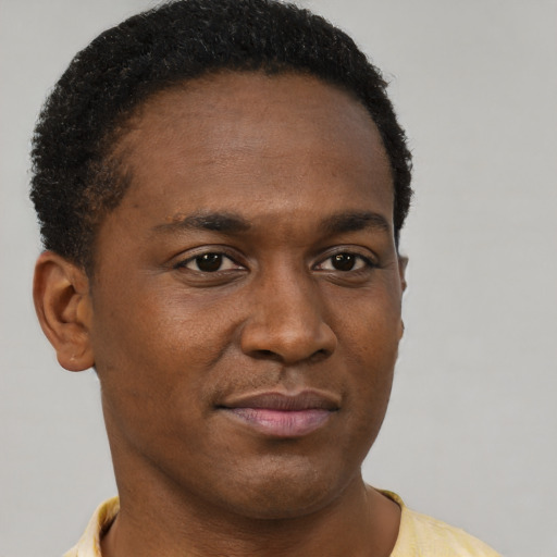 Neutral black young-adult male with short  brown hair and brown eyes