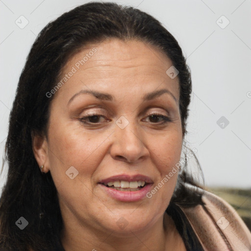 Joyful white adult female with long  brown hair and brown eyes