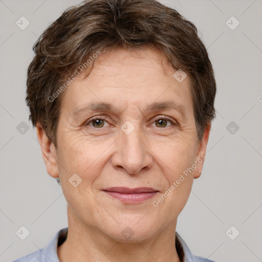 Joyful white adult female with short  brown hair and brown eyes