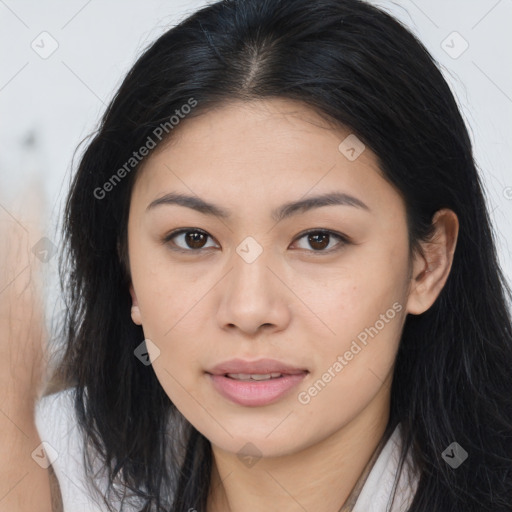 Joyful asian young-adult female with long  brown hair and brown eyes