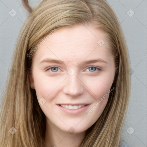 Joyful white young-adult female with long  brown hair and grey eyes