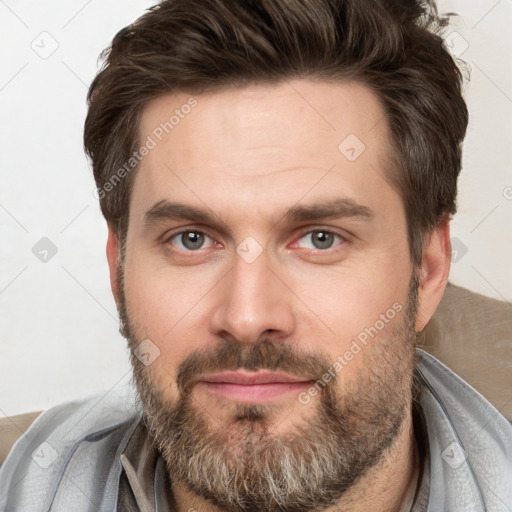 Neutral white adult male with short  brown hair and brown eyes