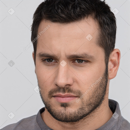 Neutral white young-adult male with short  brown hair and brown eyes