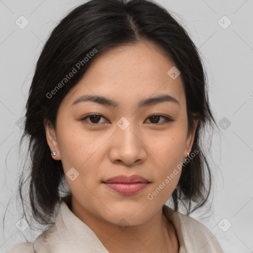 Joyful asian young-adult female with medium  brown hair and brown eyes