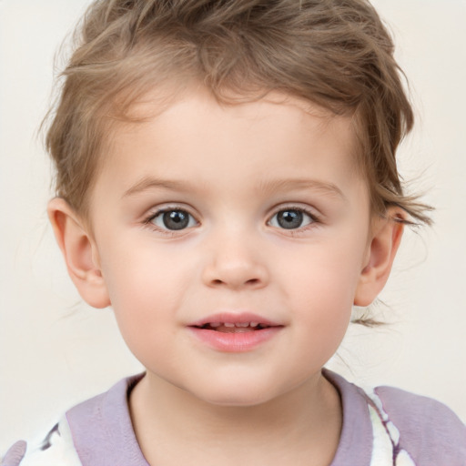 Joyful white child male with short  brown hair and brown eyes