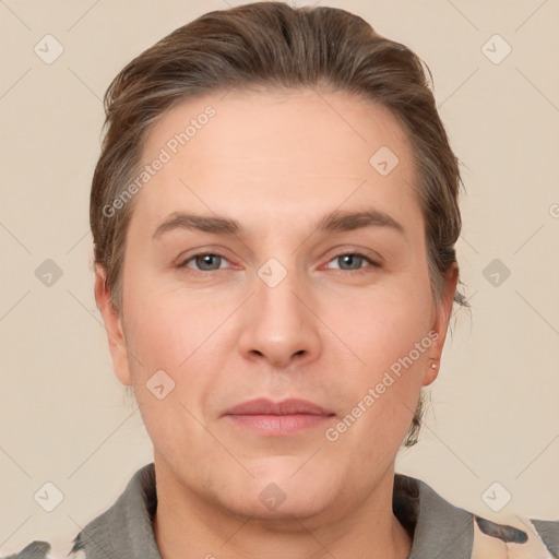 Joyful white adult male with short  brown hair and grey eyes