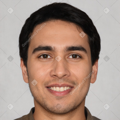 Joyful white young-adult male with short  black hair and brown eyes