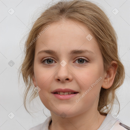 Joyful white child female with medium  brown hair and grey eyes