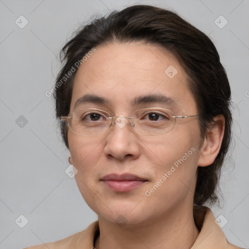 Joyful white adult female with medium  brown hair and brown eyes