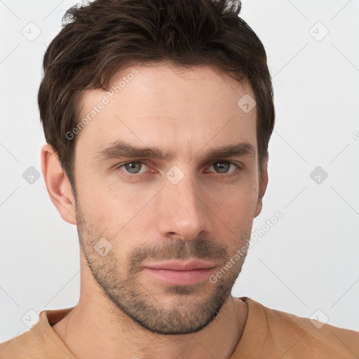 Neutral white young-adult male with short  brown hair and brown eyes