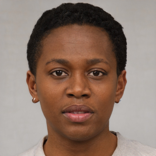 Neutral black young-adult female with short  black hair and brown eyes