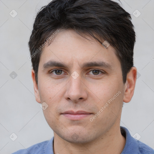 Neutral white young-adult male with short  brown hair and brown eyes