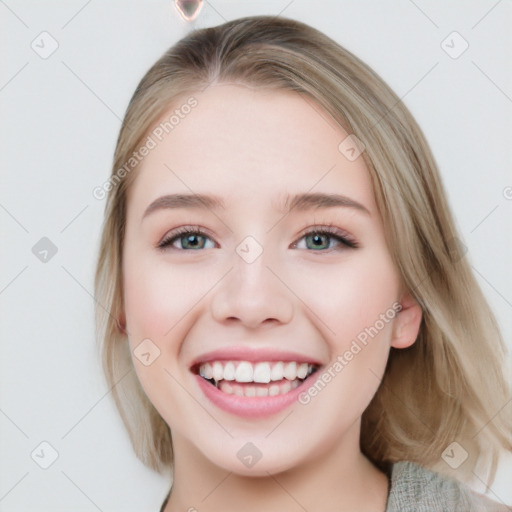 Joyful white young-adult female with medium  brown hair and blue eyes