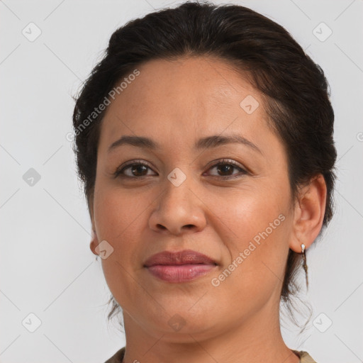 Joyful white adult female with medium  brown hair and brown eyes