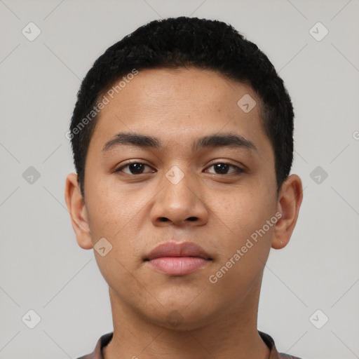 Neutral latino young-adult male with short  black hair and brown eyes