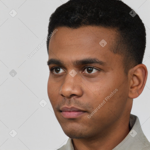 Neutral latino young-adult male with short  black hair and brown eyes