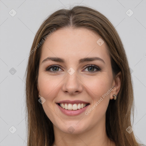 Joyful white young-adult female with long  brown hair and grey eyes