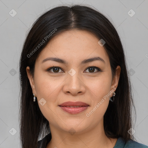 Joyful latino young-adult female with medium  brown hair and brown eyes