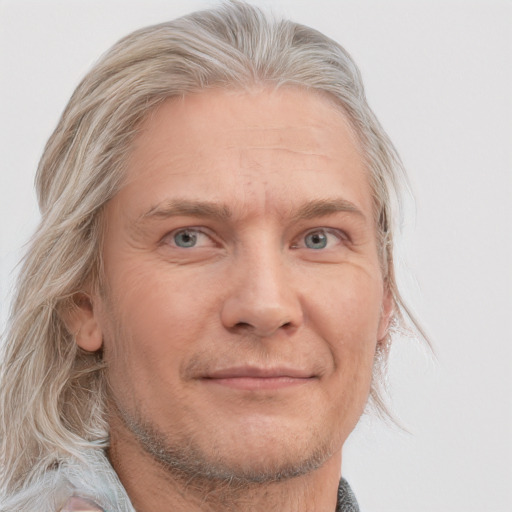 Neutral white adult male with medium  blond hair and grey eyes
